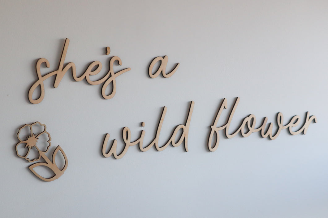 ‘She’s a wildflower’ wooden wall script